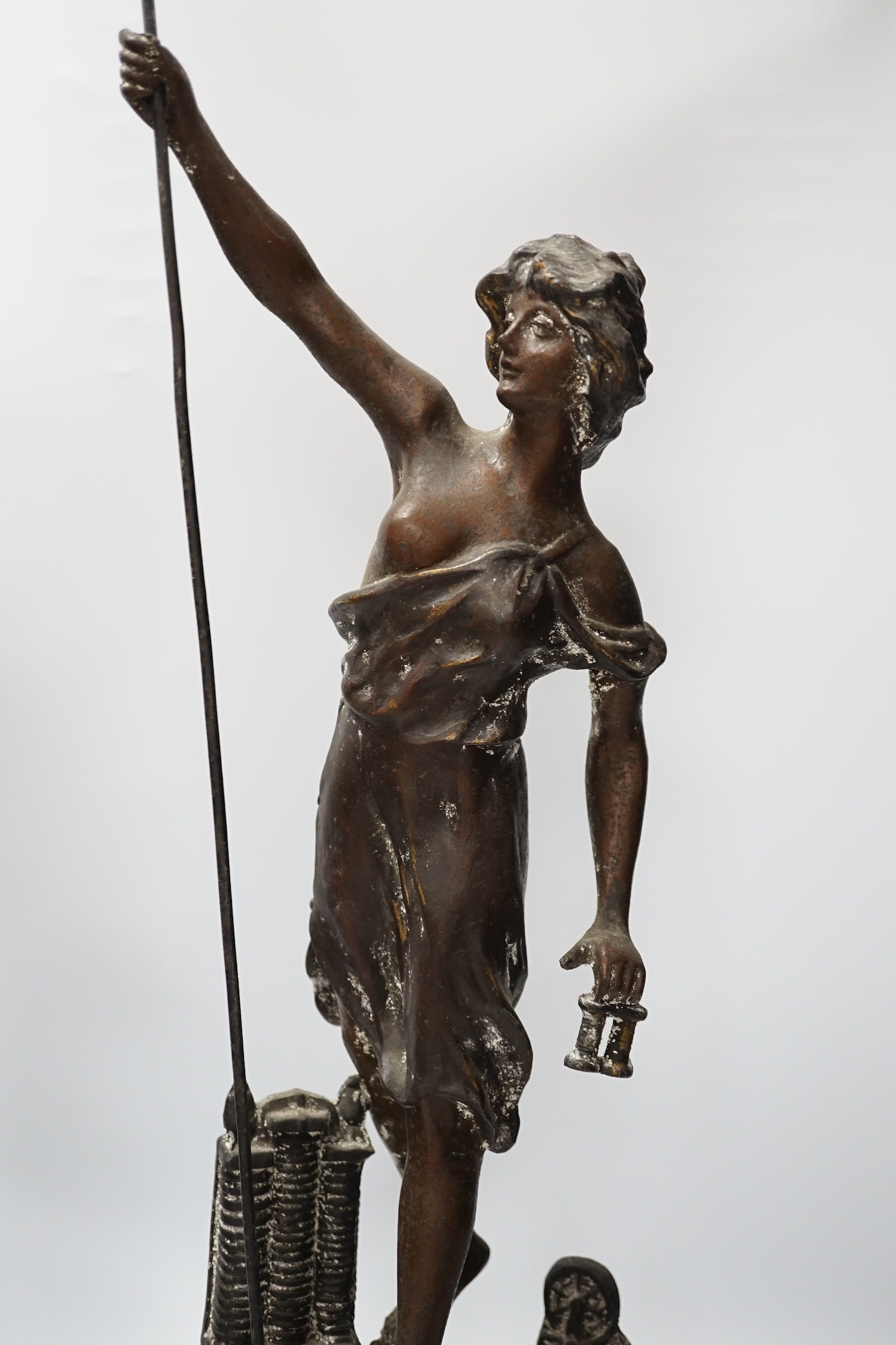 A pair of late 19th century, spelter classical figures on stands, tallest 78cm high